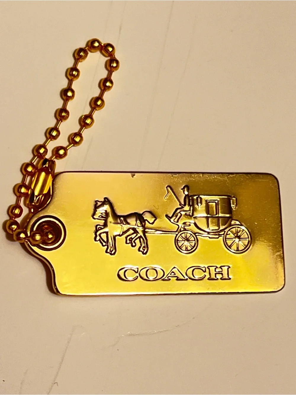 Very Rare Vintage Coach Gold Horse & Carriage Tag Key Holder and bag charm.
